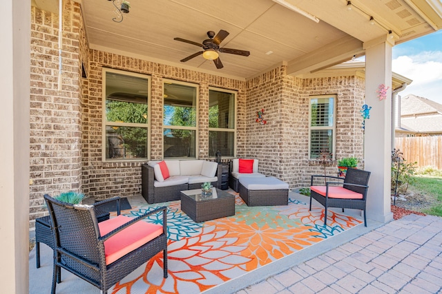 view of patio featuring outdoor lounge area and ceiling fan