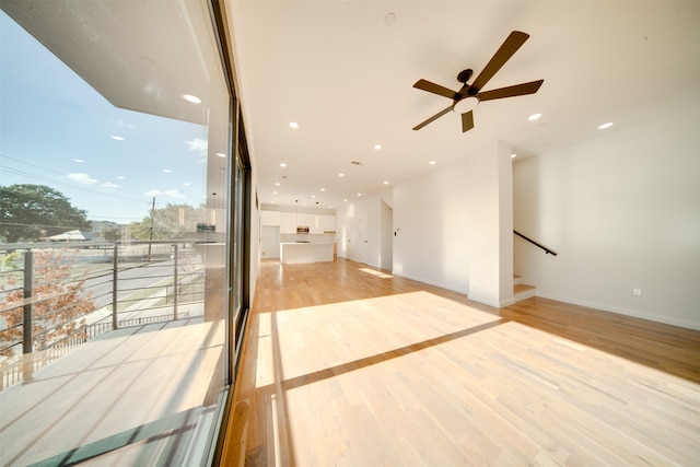 spare room with light hardwood / wood-style flooring