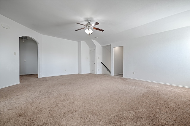 unfurnished room with carpet flooring and ceiling fan