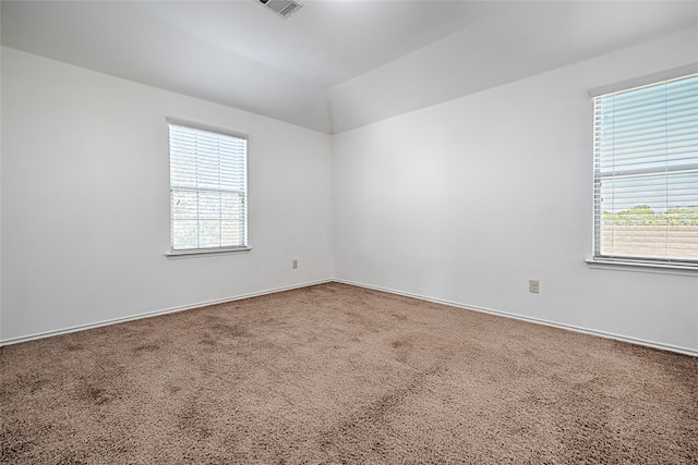 unfurnished room featuring carpet