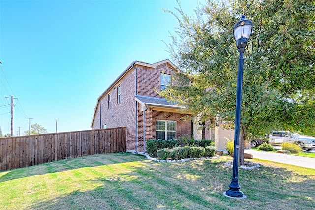 view of front of property with a front lawn