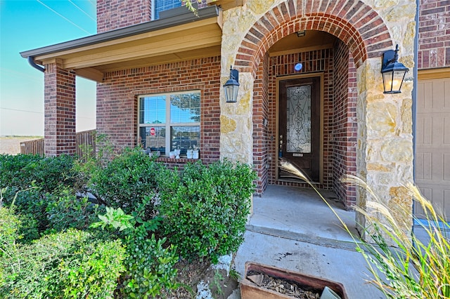 property entrance with a garage