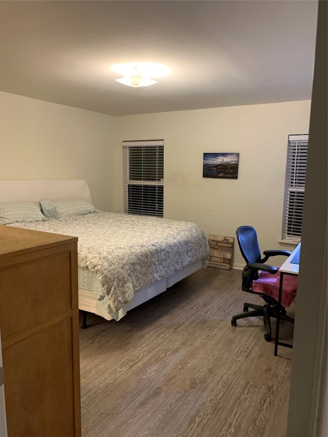 bedroom featuring dark hardwood / wood-style floors