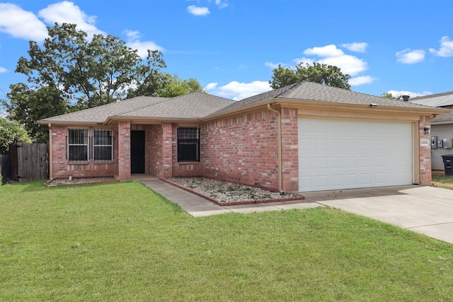 single story home featuring a front yard and a garage