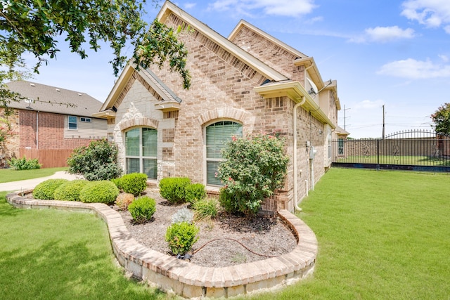 view of front of house with a front lawn