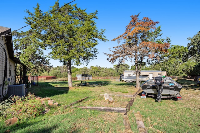 view of yard featuring central AC