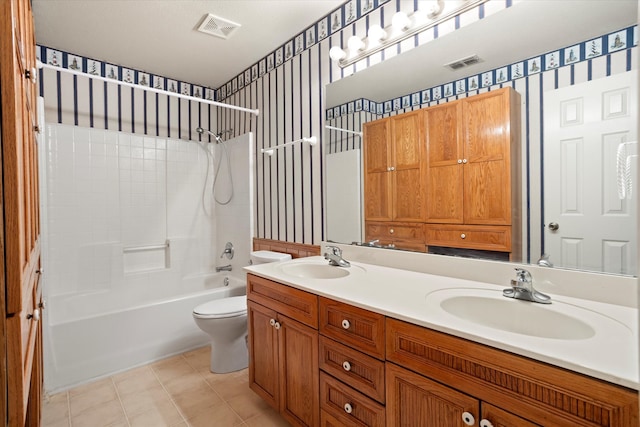 full bathroom with vanity, toilet, tile patterned floors, and  shower combination