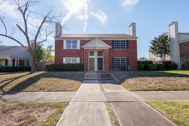 view of front of house with a front yard