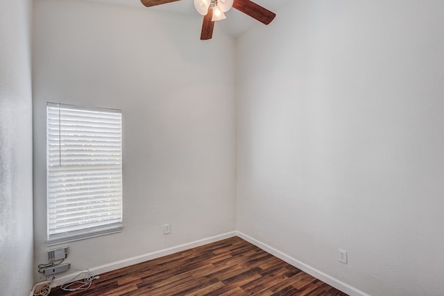 empty room with dark hardwood / wood-style flooring, ceiling fan, and a wealth of natural light