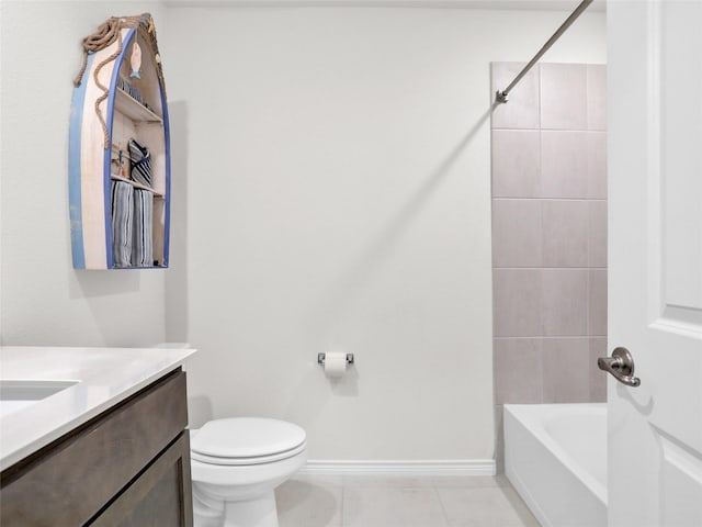 full bathroom featuring vanity, toilet, tiled shower / bath combo, and tile patterned flooring