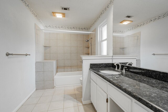 bathroom featuring a healthy amount of sunlight, toilet, and tiled shower / bath