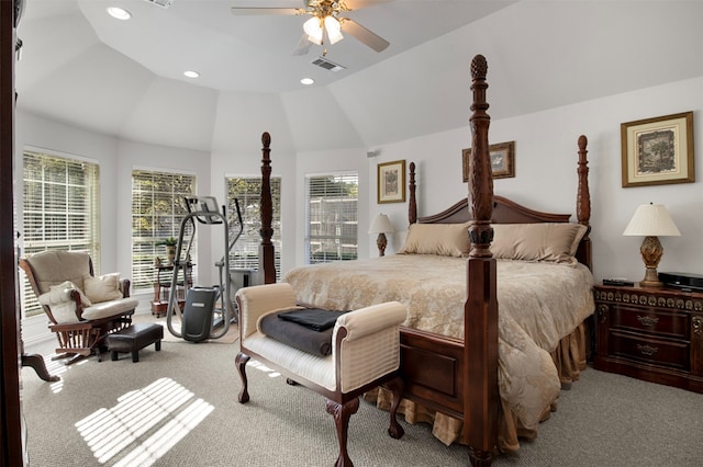 carpeted bedroom with vaulted ceiling, multiple windows, and ceiling fan