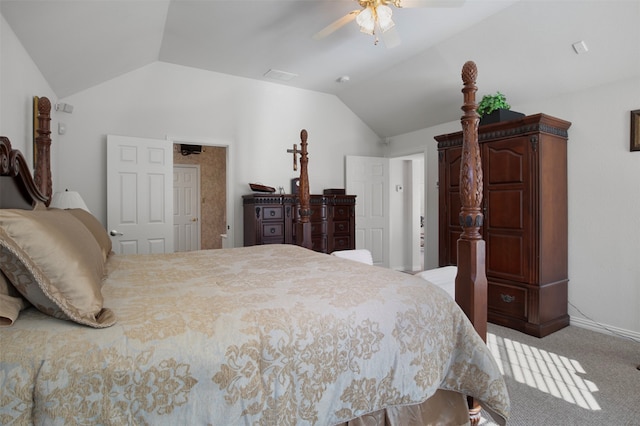 bedroom with ceiling fan, light carpet, and vaulted ceiling