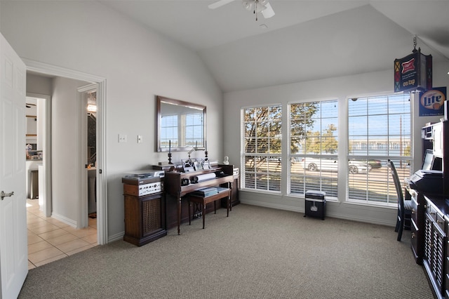 carpeted office with ceiling fan and lofted ceiling