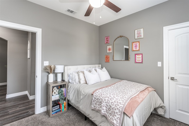 bedroom featuring dark wood-type flooring and ceiling fan