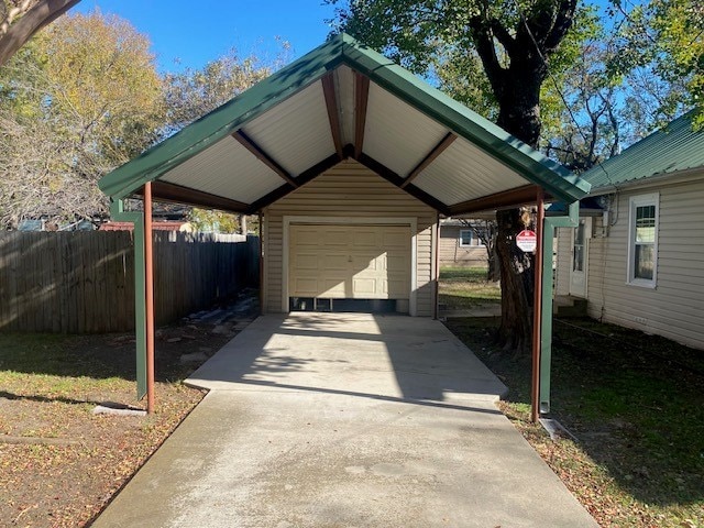 exterior space with a carport