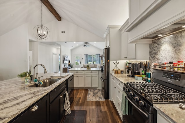 kitchen with white cabinets, black appliances, sink, and decorative light fixtures