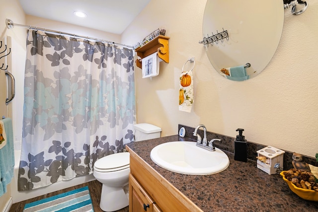 bathroom featuring hardwood / wood-style flooring, vanity, and toilet