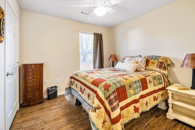 bedroom featuring ceiling fan and hardwood / wood-style flooring