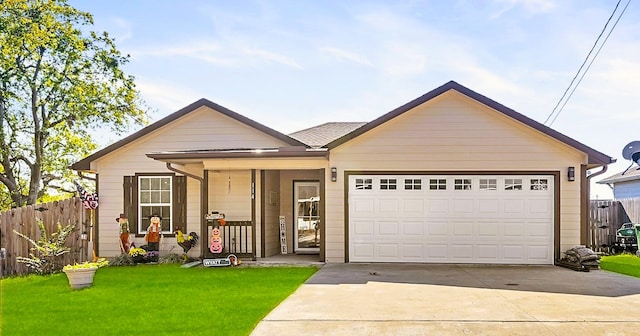 view of front facade with a garage and a front lawn