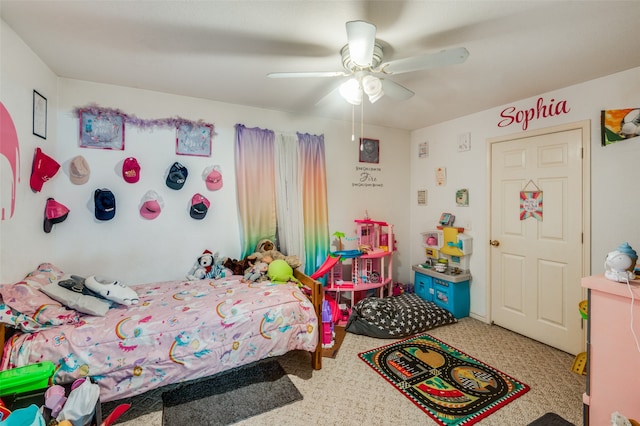 carpeted bedroom with ceiling fan