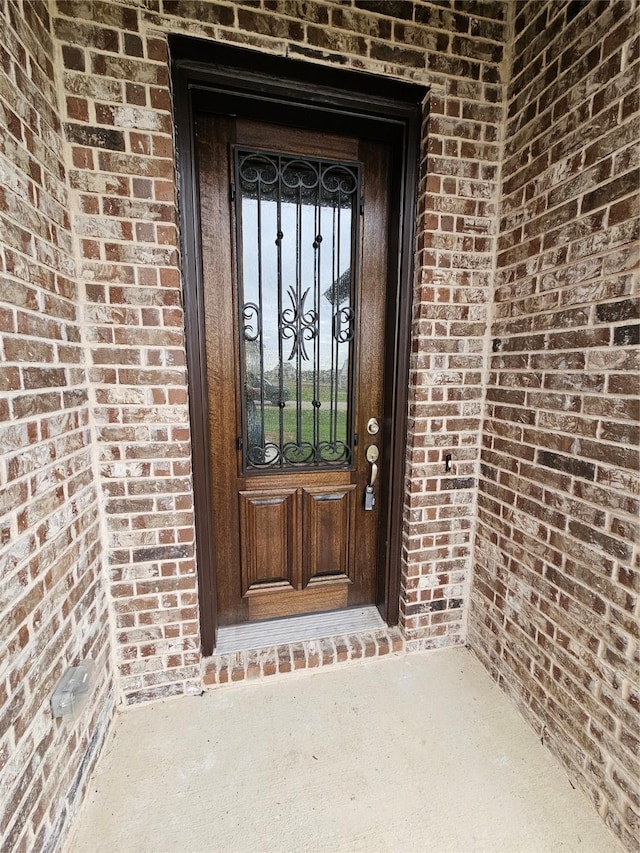 view of exterior entry featuring french doors