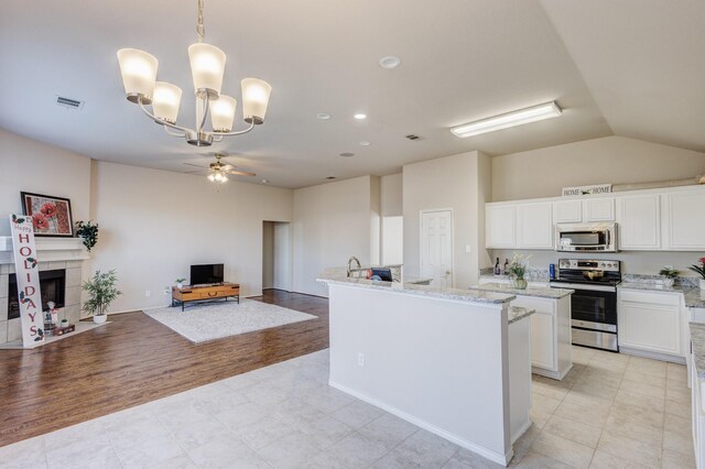 unfurnished dining area with lofted ceiling and a chandelier