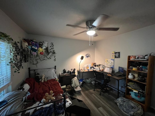 bedroom featuring wood-type flooring and ceiling fan