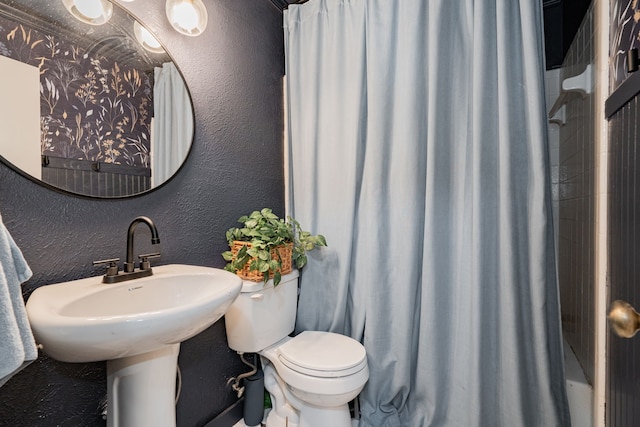 bathroom with walk in shower and toilet