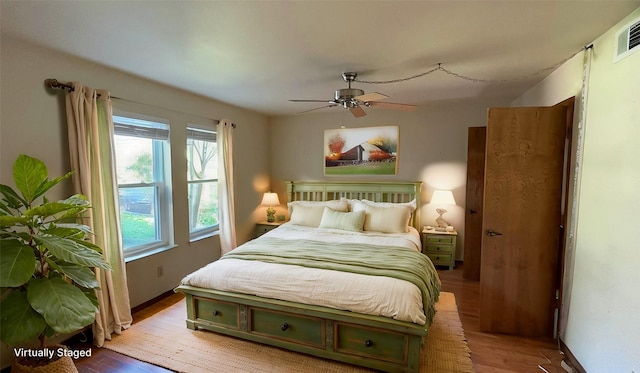 bedroom featuring ceiling fan and light wood-type flooring