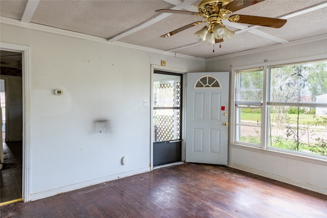 entryway with a textured ceiling, plenty of natural light, and hardwood / wood-style floors