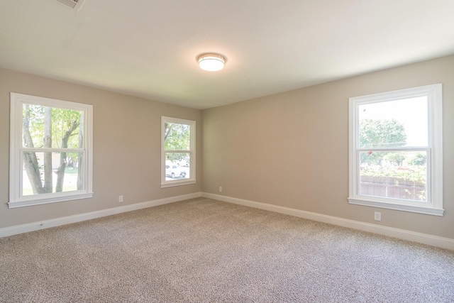 view of carpeted spare room