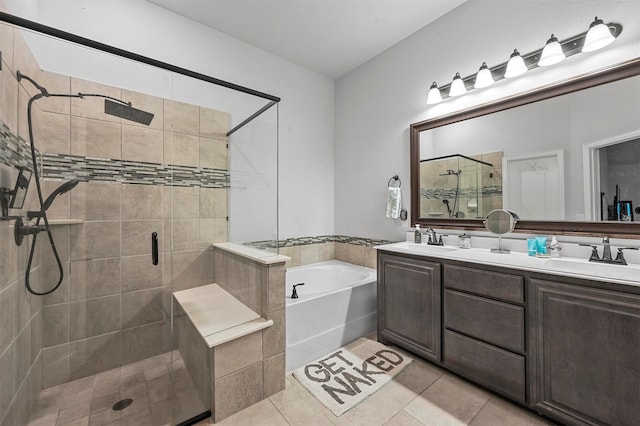 bathroom with vanity, plus walk in shower, and tile patterned floors