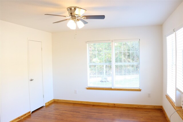 unfurnished bedroom featuring ceiling fan and wood-type flooring