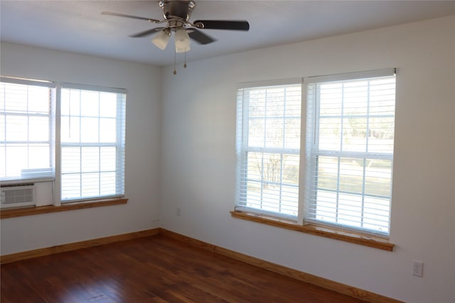 unfurnished room featuring ceiling fan and dark hardwood / wood-style floors