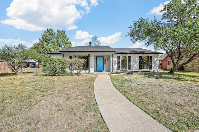 view of front of house with a front yard