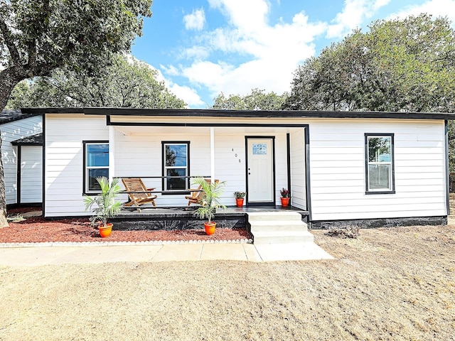 view of front of home featuring covered porch