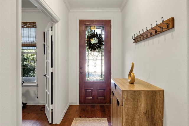 foyer entrance featuring dark hardwood / wood-style flooring and crown molding