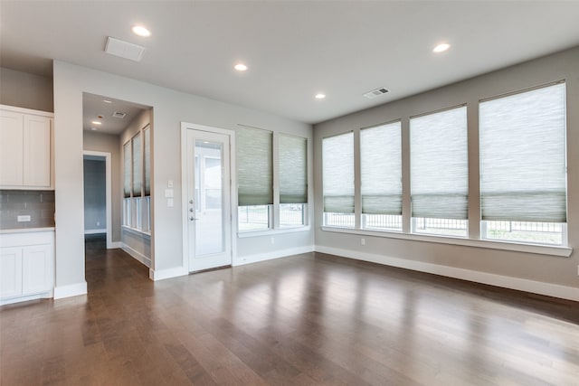 interior space with dark hardwood / wood-style floors