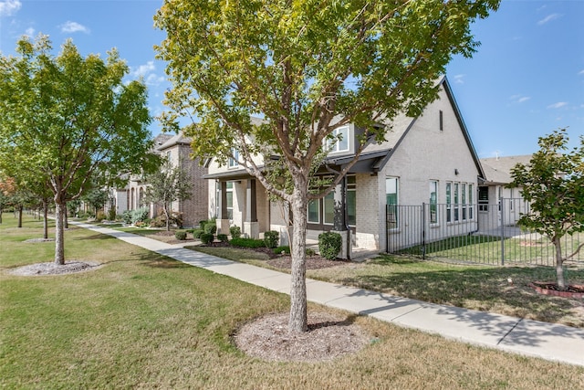 view of front of house featuring a front lawn