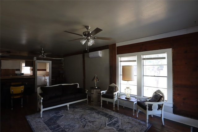 living area featuring an AC wall unit, dark wood-type flooring, and ceiling fan