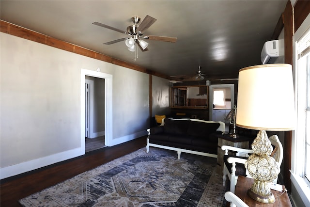 living room with ceiling fan, dark hardwood / wood-style flooring, and a wall unit AC