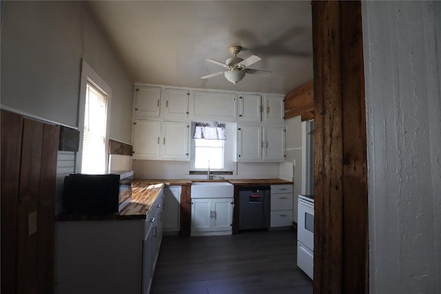 kitchen featuring sink, butcher block countertops, dark hardwood / wood-style floors, white appliances, and white cabinets