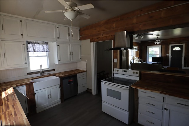 kitchen featuring sink, wooden counters, white cabinets, and white range with electric cooktop