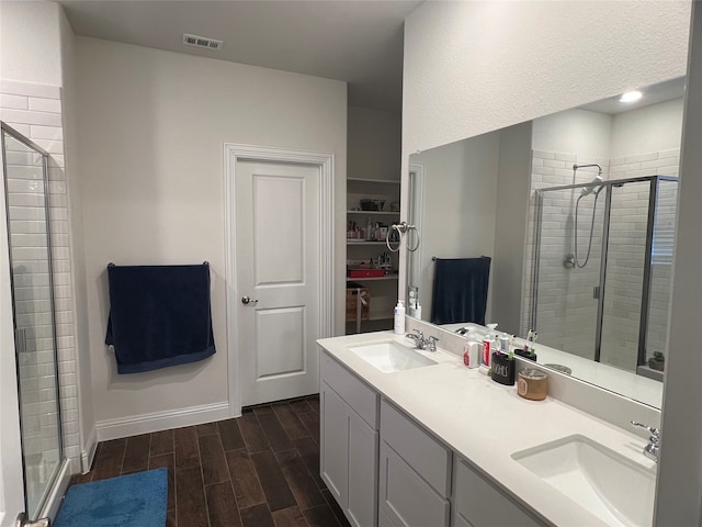 bathroom featuring vanity and walk in shower