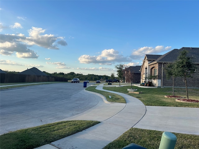 view of community featuring a yard