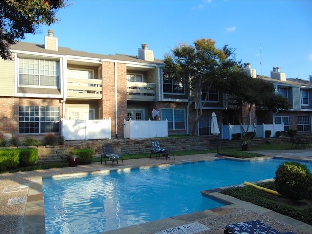 8555 Fair Oaks Xing Unit 505, Dallas, TX 75243 - view of swimming pool with fence