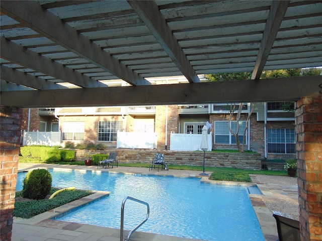 view of pool featuring a patio and a pergola