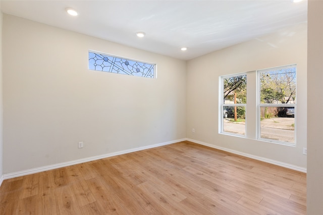 empty room with light wood-type flooring