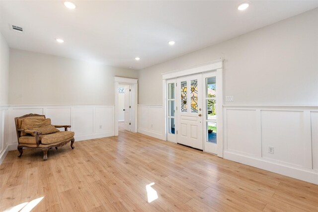 foyer with light hardwood / wood-style flooring